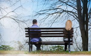Couple Sitting on Bench